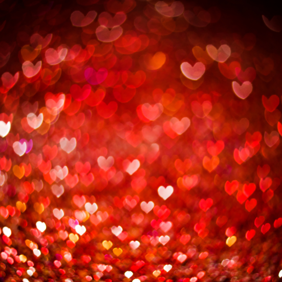 Baggrund med lysende hjerter.